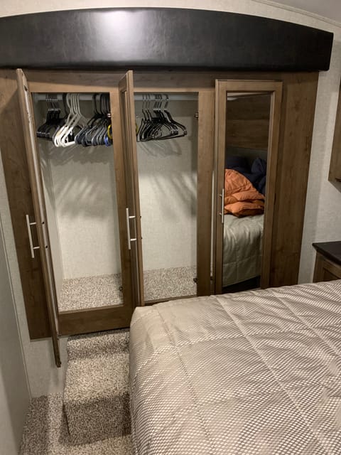 Master bedroom with slide out closet