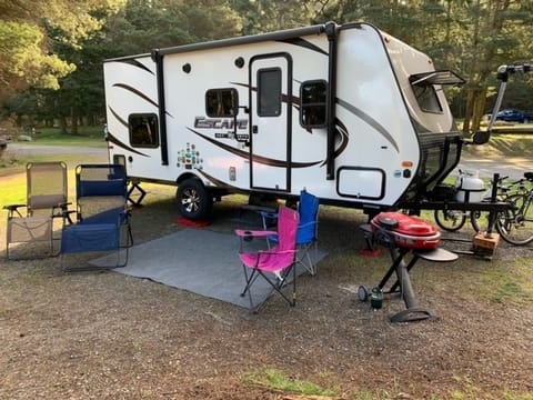 Camper, two recliners, two folding chairs, grill. Optional bike rack.