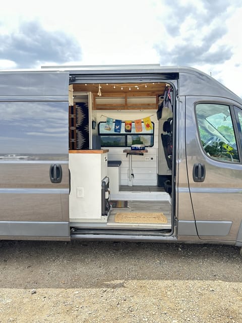 Welcome to your van vacation! Step inside and start your adventure in comfort and style.