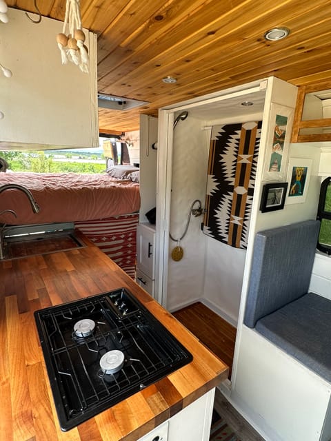 Take a look at the well-appointed shower and cozy sleeping area, designed for your comfort and convenience.