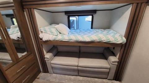 the bunkbed folds up and the couch pulls out into a full-size bed.