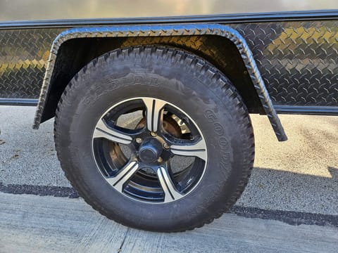 The tires allow for worry-free towing, especially when trying to park the trailer in the perfect spot. Not pictured is a spare tire that is stored under the trailer.