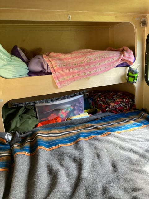 Two bunk beds. 4ft 10 inches by 23 inches. Can be used for storage or as beds for children.
