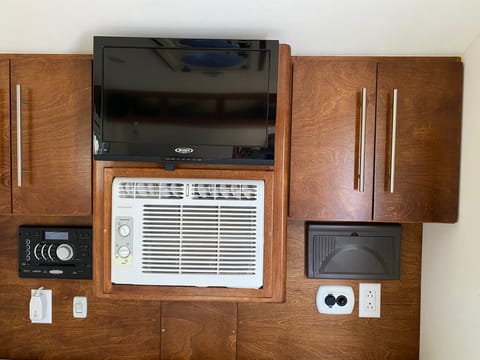 TV, DVD, Stereo, AC, Fuse Box, DC/AC outlet and Storage