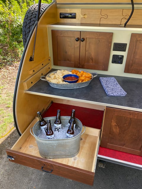 Whether camping alone, or with friends, the large galley is perfect for cooking or entertaining.
