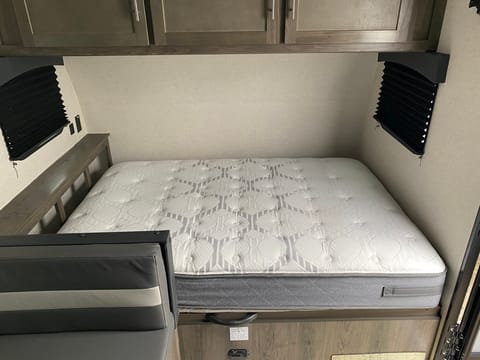 Master sleeping area with a full size mattress 