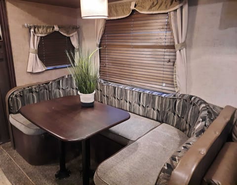 enjoy your meal or a friendly game of cards at this roomy dinette setting