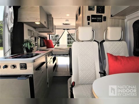 Dinette featuring automotive-grade seating with 3-point seatbelts for more secure travel