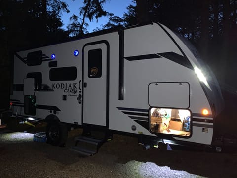 with lights under the trailer, and through the pass through, it’s easy to accomplish whatever you need to.there are also lights on the Bluetooth speakers and a strip of lights under the awning.