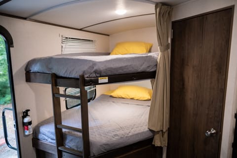 The Keystone Passport has Full-size bunks, perfect for kiddos or adults!