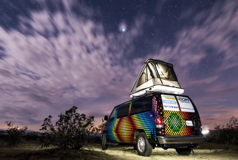 Escape Campervan with the rooftop tent set up. 