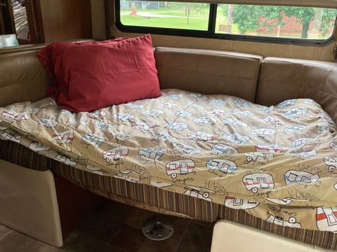 Dinette converts into full sized bed. 