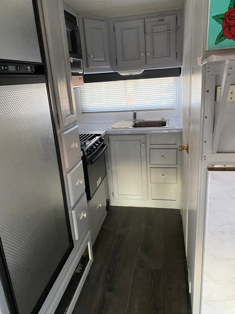 Fully-Stocked Kitchen. With stove, microwave and New refrigerator