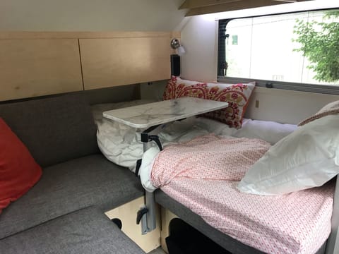 Set up as a single bed and couch