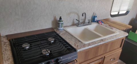 sink and stove in the kitchen