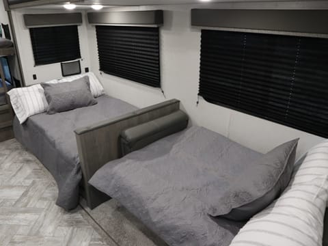 Dinette and couch folded down into beds.