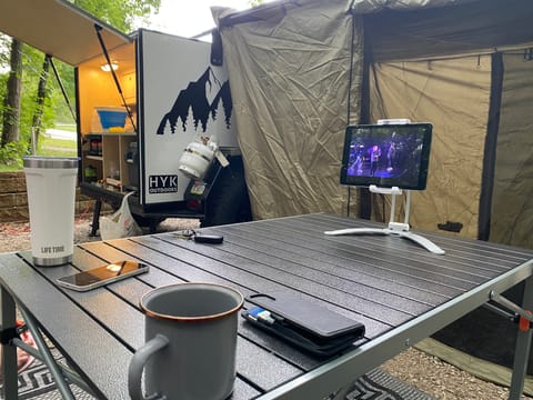 Showing camping table and ipad stand. 