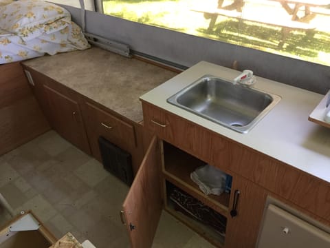 Sink, cupboards, and counter area