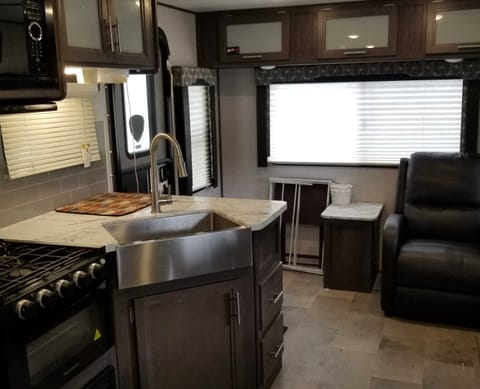 Farmhouse Sink!!! Dry rack and tray table included. Other recliner near door available.