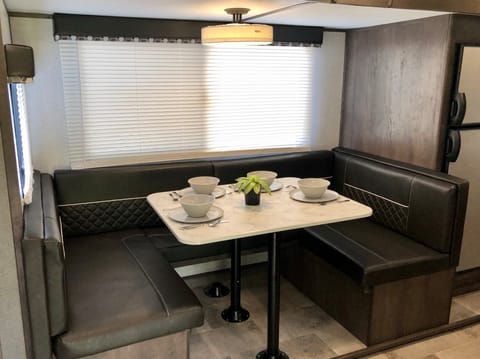 Dinette area can seat up to 6 people and has more than your average RV elbow-room.