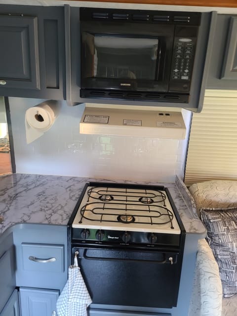Microwave, propane oven, and propane stove