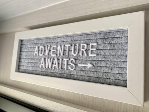 Personalize the sign for your adventure!  Small bin of characters available for use.