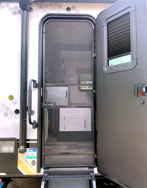 Entering the camper is an ease with 4 sturdy, wide steps. Screen door keeps the outdoors out!
