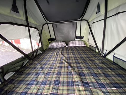 Inside the Tepui Tent. Thule Tepui Ruggedized Kukenam
3-person roof top tent. 
Dimensions (Open)	96 x 56 x 52 in