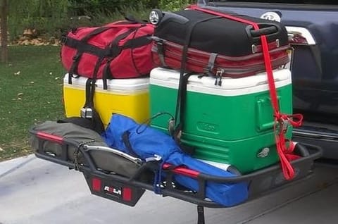 This Hitch Mounted Camping Gear Rack allows you to have seating for 5 and plenty of luggage room inside.
