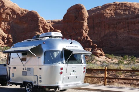 Roll-out awnings provide shade in a sunny spot.