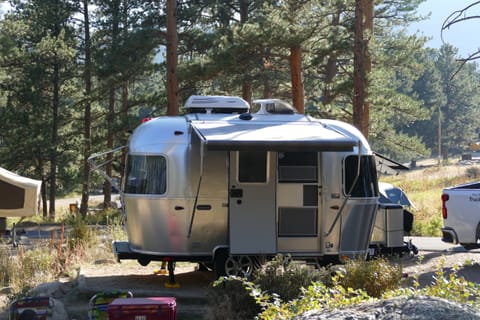 A screen door allows for air flow while parked in camp.