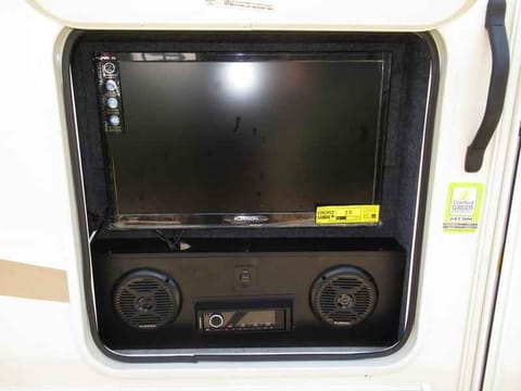Exterior entertainment center with 24" tv with stereo and dvd player with USB port to steam from apple or android devices