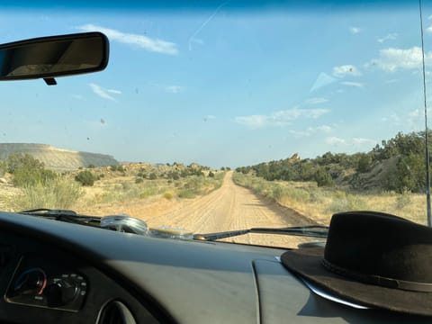 Let us know if you're planning on driving on dirt roads. Forest service roads that are graded like this are ok, but anything more is off-limits.