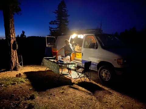 Cook outside under the full moon. The floor mat extends your living space and makes it easy to go from the kitchen to the van and back again.