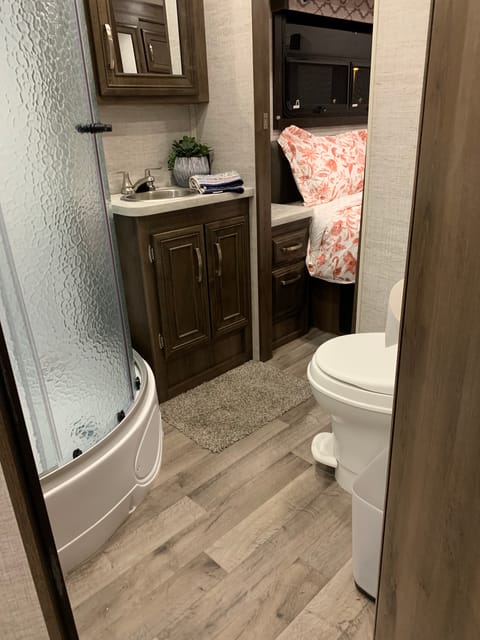 spacious bathroom and shower 