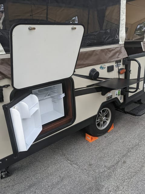 The camper has 2 outdoor attached tables for your convenience.