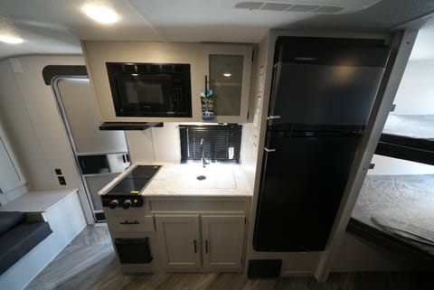 Large fridge, microwave, stove