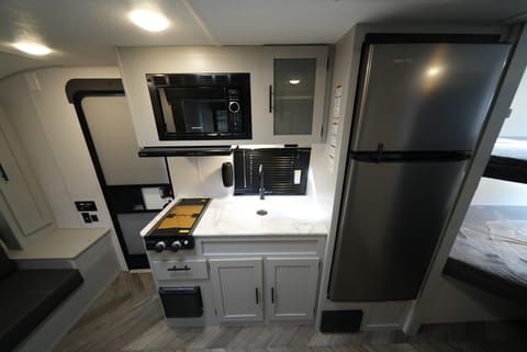 Large fridge, stove, microwave