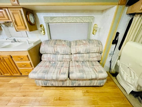This comfortable couch turns into a pull out bed. Extra blankets can be found in the laundry area.