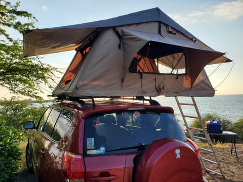 SmittyBuilt Overlander tent, equipped with built in matress pad, comfortably sleeps 2. What a view!