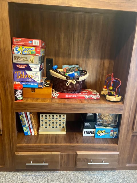 Games/puzzles stocked in bunk room. 