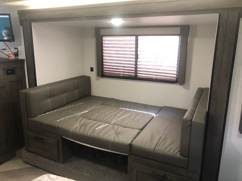 Full size bed that was converted from dinette 