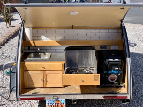 Sink, 2 burner stove and Fridge/Freezer