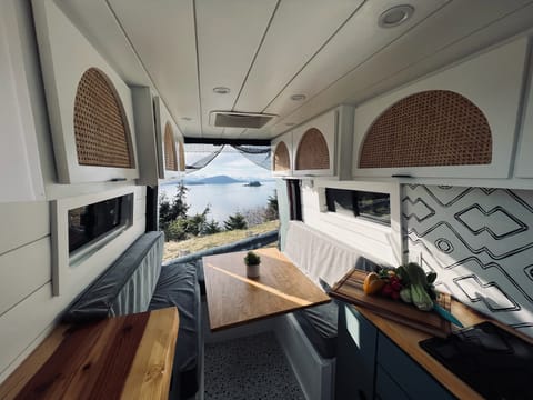 View out the back of the van with dining table up