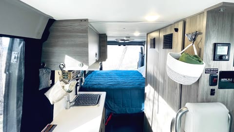 All clean and new, comfortable bed with soft topper pad and a zen place to take an afternoon nap.

At 6'2", the murphy bed is just long enough for me.