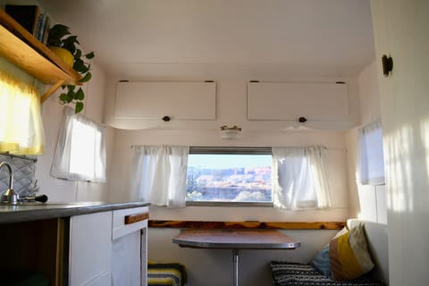 Camp in style- enjoy this vintage camper delivered to your campsite. RV in Capitol Reef