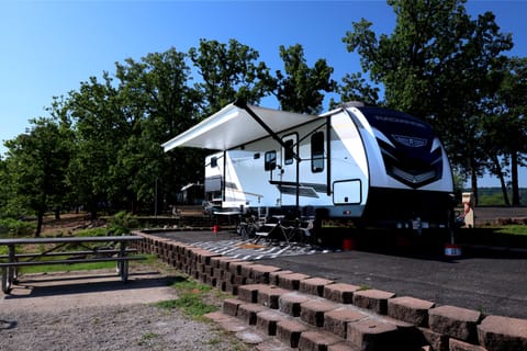 Our Cruise Radiance 28QP near Table Rock Lake near Branson Missouri and Lake Of The Ozarks Missouri presented by Stone Mountain RV & Camper Rentals