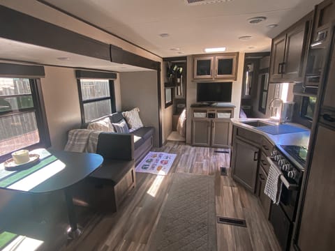 The slide out has the couch and dinette on it which gives the trailer a little bit more of a roomy feeling.
