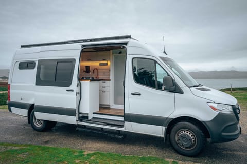 The Mammoth Campervan from Scenic Vans comes with a full shower, toilet, dinette conversion that converts into a near king bed, propane stove, fridge, fan, heater, bluetooth rear speakers, offgrid electrical system including solar and alternator charging.  Its our best seller!