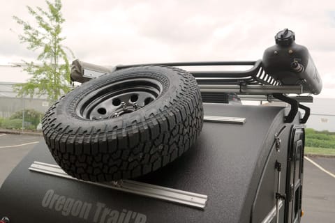 Our custom Rear-Carrier Rack system is not only an incredibly functional feature of our trailers, but it looks great with our DDA model. 